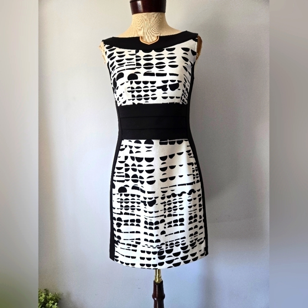 Joseph Ribkoff Black And White Broken Polka Dot Dress With Gold Neck Detail. 4